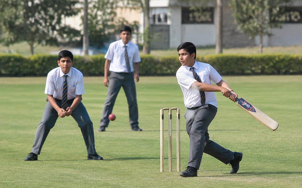 NAS Academy students playing sports on the school ground
